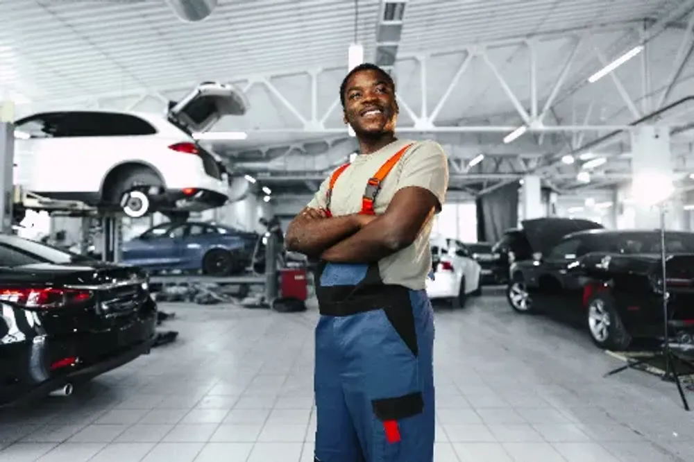 Courtesy car service — mechanic at car repair shop